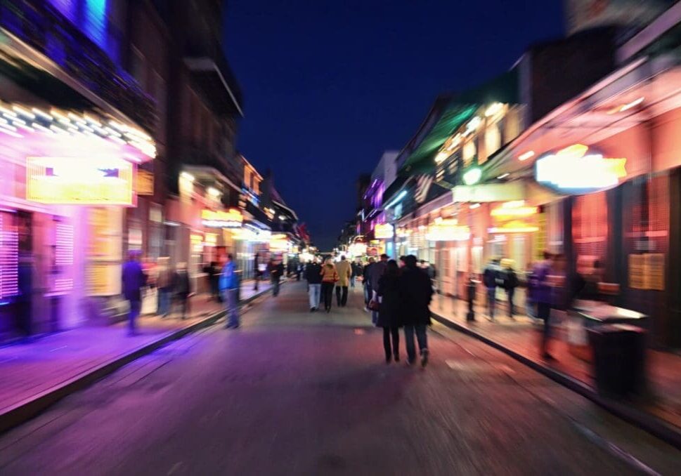 fm=f_2194 A street with people walking on it at night.